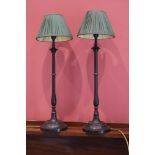 A PAIR OF BRONZE TABLE LAMPS