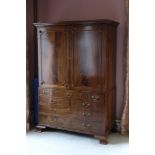 A GEORGE III STYLE MAHOGANY LINEN PRESS BY MARTIN DODGE