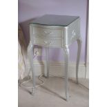 A PAIR OF BEDSIDE TABLES