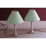 A PAIR OF MODERN SILVERED FLUTED COLUMN TABLE LAMPS
