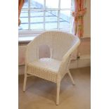 A WHITE PAINTED WICKER CHAIR