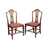 A SET OF SIX MAHOGANY DINING CHAIRS IN GEORGE III STYLE,