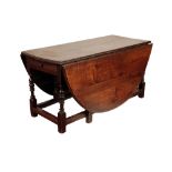 A FINE AND SUBSTANTIAL WILLIAM & MARY OAK GATELEG TABLE,