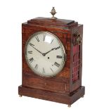 A REGENCY ROSEWOOD AND BRASS INLAID BRACKET CLOCK
