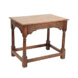 A CHARLES II OAK SIDE TABLE,