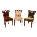 A SET OF SIX VICTORIAN CARVED ROSEWOOD AND UPHOLSTERED DINING CHAIRS,