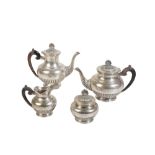 AN ITALIAN MID 20TH CENTURY SILVER COLOURED FOUR PIECE TEA AND COFFEE SERVICE BY ILARIO PRADELLA,