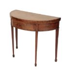 A WALNUT DEMI-LUNE CARD TABLE IN GEORGE II STYLE,