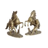 AFTER GUILLAUME COUSTOU THE ELDER, PAIR OF GILT METAL MODELS OF THE MARLY HORSES,
