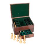 A LATE VICTORIAN /EDWARDIAN TURNED BOXWOOD AND EBONISED STAUNTON PATTERN CHESS SET,