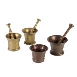 A GROUP OF FOUR LEADED BRONZE AND BRASS MORTARS,