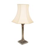 A SILVER PLATED METAL COLUMNAR TABLE LAMP,