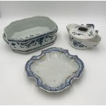 A DUTCH DELFTWARE BLUE AND WHITE CISTERN