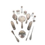 A GROUP OF SILVER MOUNTED DRESSING TABLE ITEMS,