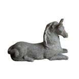 A STONE COMPOSITION GARDEN MODEL OF A RECUMBENT FOAL,