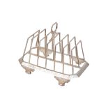 AN EARLY VICTORIAN SILVER TOAST RACK BY JOHN WILLIAM FIGG,