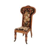 A VICTORIAN WALNUT AND TAPESTRY UPHOLSTERED PRIE DIEU CHAIR IN REFORMED GOTHIC STYLE,