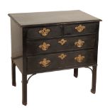 A LATE GEORGE II EBONISED WOOD CHEST OF DRAWERS,