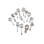 A SMALL GROUP OF SILVER CADDY SPOONS,