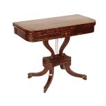 A GEORGE IV GONCALO ALVES AND BRASS STRUNG CARD TABLE,