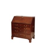 A GEORGE III MAHOGANY BUREAU,