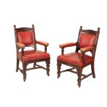 A PAIR OF VICTORIAN CARVED MAHOGANY AND UPHOLSTERED ELBOW CHAIRS,