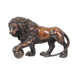 AFTER FERNANDO TACCA, A BRONZE MODEL OF ONE OF THE TWO MEDICI LIONS,