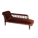 A VICTORIAN STAINED HARDWOOD AND VELVET UPHOLSTERED CHAISE LONGUE,