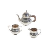 A GEORGE V SILVER TEA SERVICE BY GEORGE NATHAN & RIDLEY HAYES,