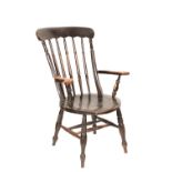 AN EBONISED OAK AND ELM WINDSOR ARMCHAIR,