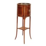 AN EDWARDIAN MAHOGANY AND CROSS BANDED JARDINIERE STAND,