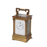 A GILT BRASS CARRIAGE CLOCK