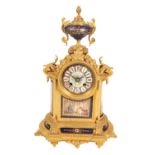 A FRENCH GILT BRONZE MANTLE CLOCK