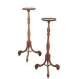 A PAIR OF WALNUT TORCHERE STANDS,