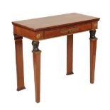 AN EMPIRE MAHOGANY AND PARCEL-GILT SIDE TABLE,