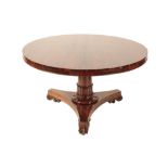 A REGENCY OR GEORGE IV ROSEWOOD BREAKFAST TABLE,