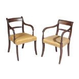 A MATCHED SET OF FOUR REGENCY MAHOGANY ELBOW CHAIRS,