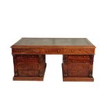 A VICTORIAN WALNUT PARTNERS' DESK,