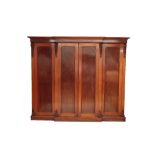 A LATE VICTORIAN MAHOGANY BREAKFRONT COMPACTUM,