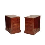 A SET OF THREE MAHOGANY FILING CABINETS,