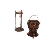 A VICTORIAN MAHOGANY, BRASS AND CAST IRON MOUNTED STICK STAND,