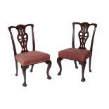 A SET OF FOUR VICTORIAN MAHOGANY AND UPHOLSTERED DINING CHAIRS IN GEORGE III STYLE