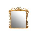 A VICTORIAN GILT CARVED WOOD AND COMPOSITION FRAMED MANTEL MIRROR,