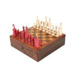 A TURNED, CARVED AND PART STAINED BONE BARLEYCORN PATTERN CHESS SET,