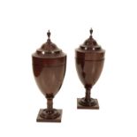 A PAIR OF STAINED HARDWOOD AND CHEQUER STRUNG KNIFE URNS IN SHERATON STYLE,