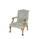 A CARVED AND PARCEL GILT WOOD AND UPHOLSTERED FAUTEUIL IN LOUIS XV STYLE,