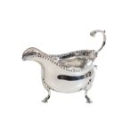 A GEORGE III SILVER SAUCE BOAT,