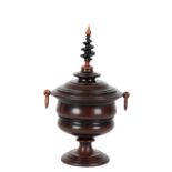 A FLEMISH TURNED MAHOGANY URN AND COVER,