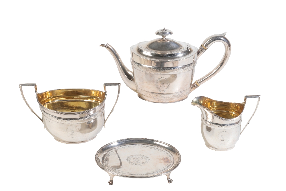 A GEORGE III SILVER THREE PIECE TEA SERVICE BY JOHN EMES,