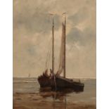 DUTCH SCHOOL, 20TH CENTURY Two boats moored at low tide